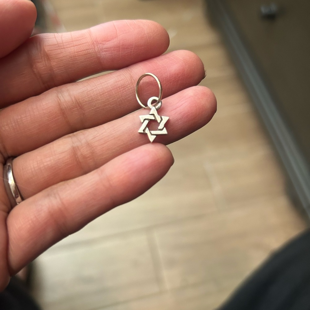 Lee Brevard 14K gold hoop and silver star charm. Individual earring.